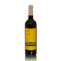 A bottle of Desea - Carignano del Sulcis wine with an intense ruby red color, featuring a label that reflects the freshness and elegance of the wine.